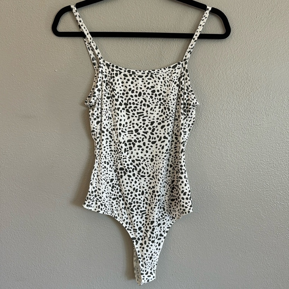 Pink Lily medium animal print bodysuit. Like new.